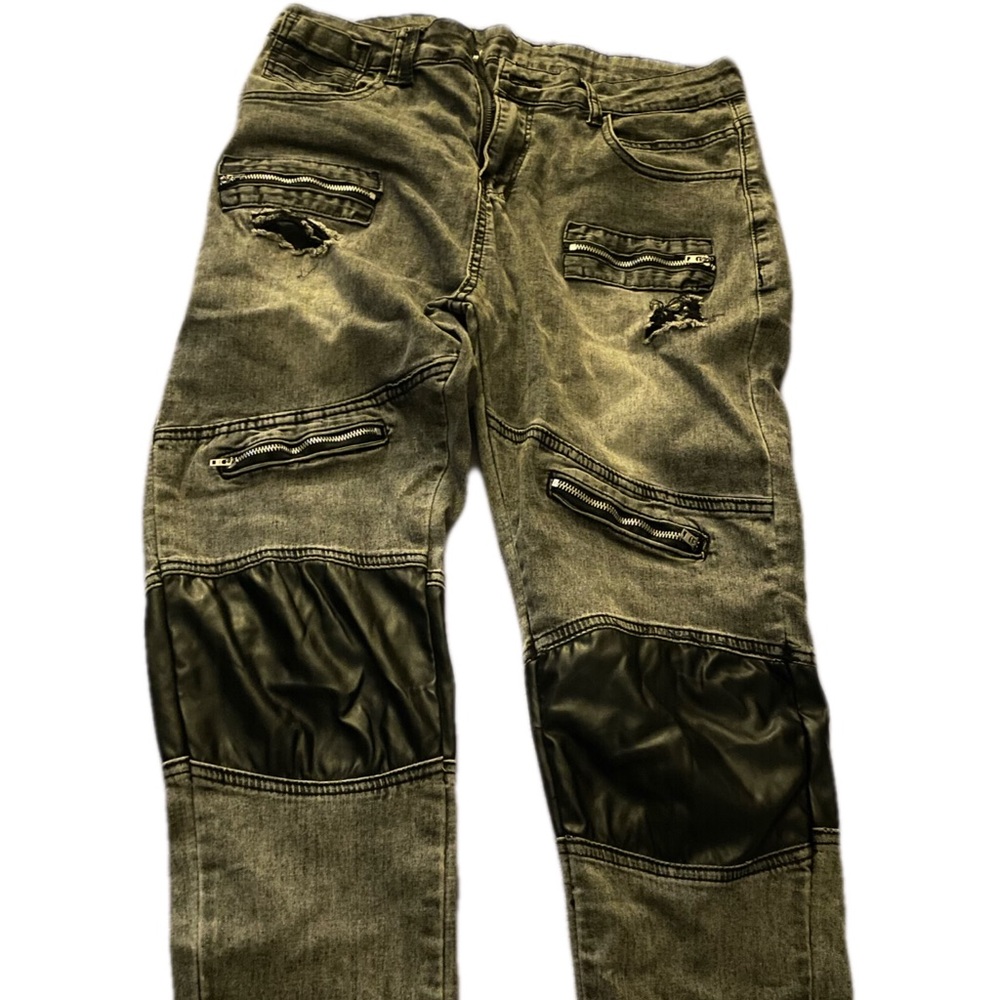 Distressed skinny jean with faux leather knee patches